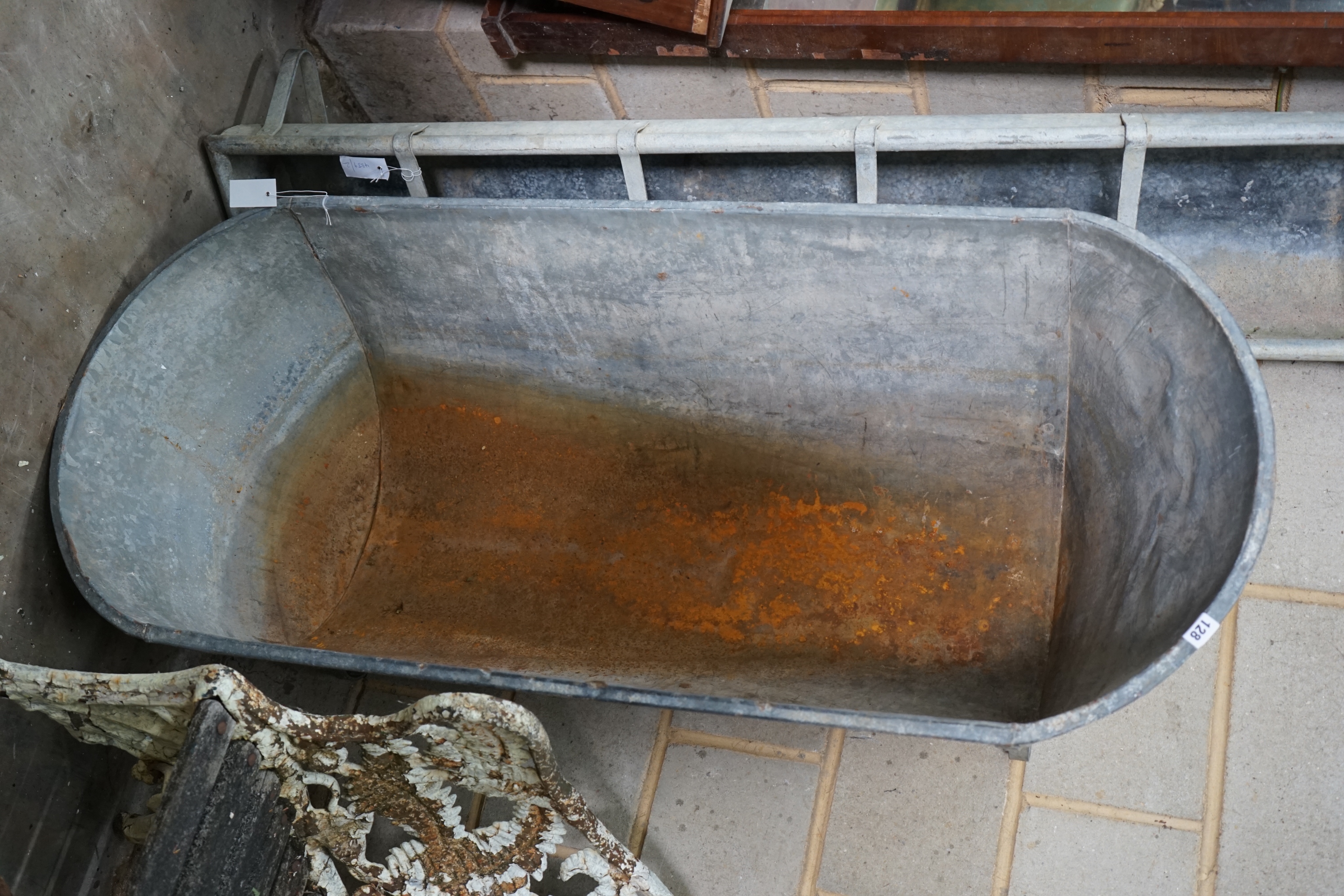 A vintage galvanised trough / planter, length 141cm depth 61cm height 48cm